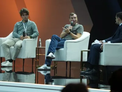 Fireside chat with gaming and innovation leaders at NGSC 2025, seated in a relaxed setting discussing industry trends