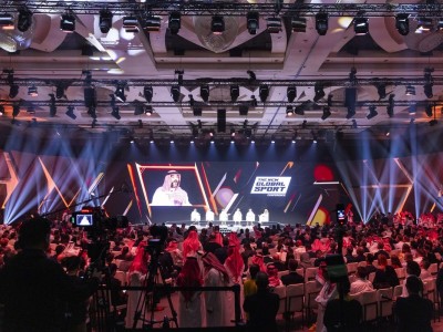 Main stage panel session at NGSC with full audience and lighting effects, showcasing esports leadership and industry innovation in Riyadh