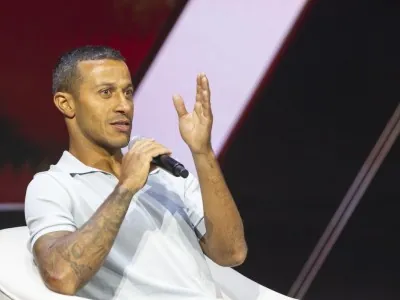 Thiago Alcântara speaking on stage during a session at the New Global Sport Conference.